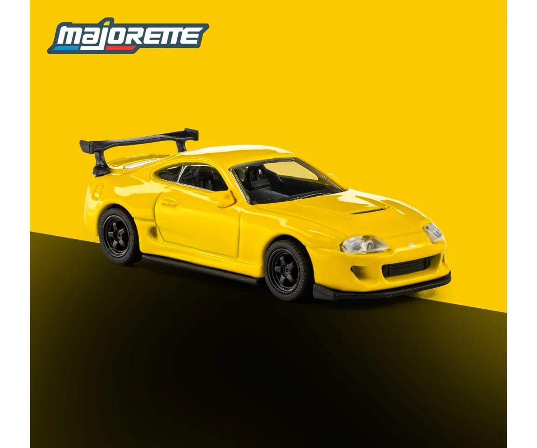 1995 Toyota Supra Yellow 1:64 scale model car - Majorette Collection